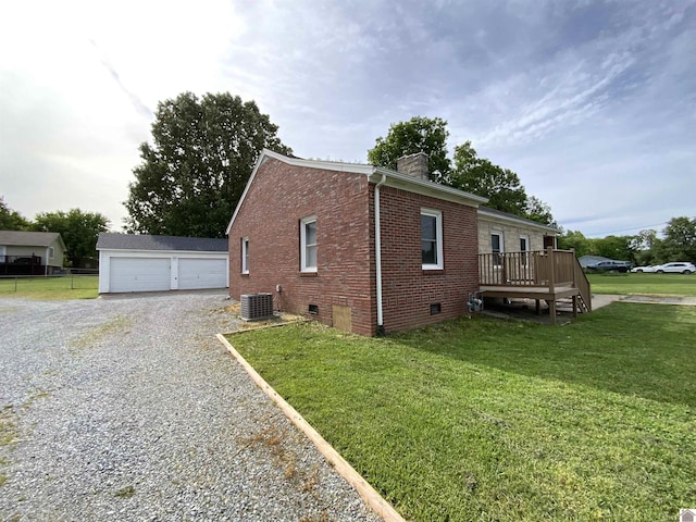 3827 Howle, Paducah, KY 42003 - view of side of property with brick siding, crawl space, a deck, a chimney, and a yard