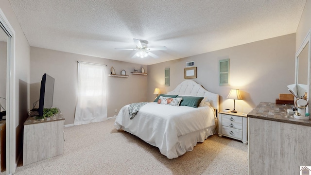 206 Metcalf Ln, Almo, KY 42020 - bedroom featuring light carpet, ceiling fan, a textured ceiling, and baseboards