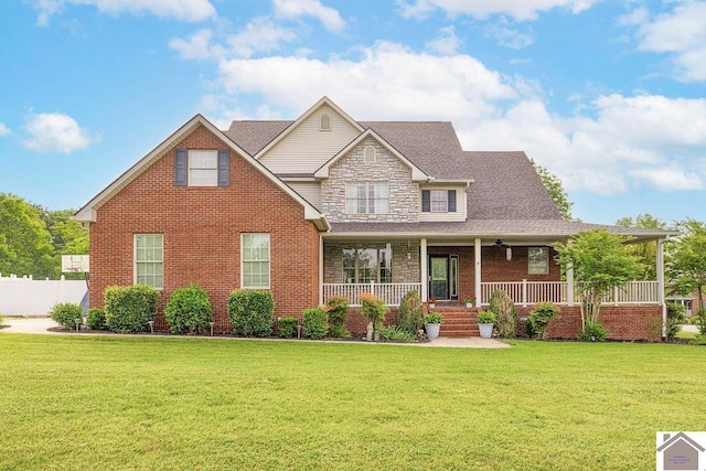 2007 Atkins Way, Murray, KY 42071 - view of front facade featuring stone siding, a porch, and brick siding