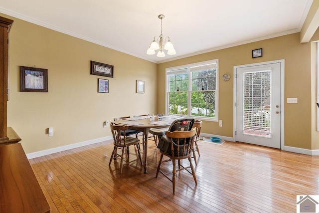 2007 Atkins Way, Murray, KY 42071 - dining room featuring light wood-style floors, baseboards, a chandelier, and crown molding