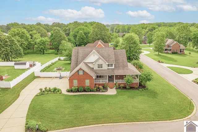 2007 Atkins Way, Murray, KY 42071 - view of front of house featuring a porch, brick siding, and concrete driveway