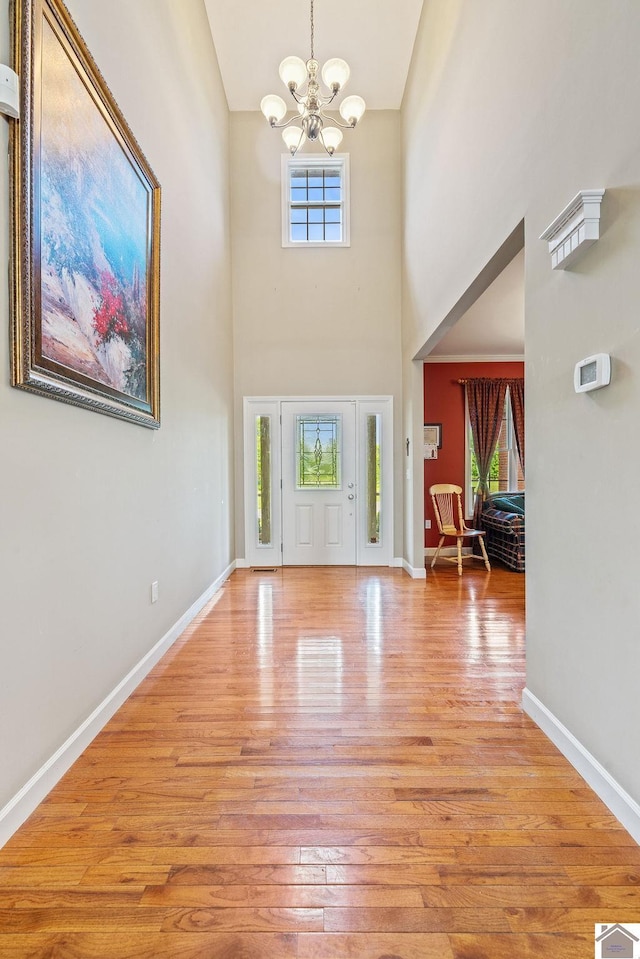 2007 Atkins Way, Murray, KY 42071 - foyer with a chandelier, a towering ceiling, light wood-style floors, and baseboards