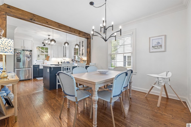 341 Friedman Ave, Paducah, KY 42001 - dining room with a chandelier, hardwood / wood-style floors, crown molding, and baseboards