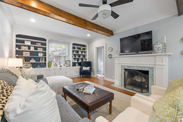341 Friedman Ave, Paducah, KY 42001 - living room featuring wood finished floors, beam ceiling, a ceiling fan, a high end fireplace, and recessed lighting