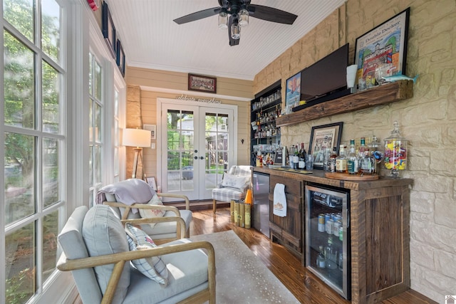 341 Friedman Ave, Paducah, KY 42001 - living area featuring wine cooler, a bar, french doors, wood finished floors, and a ceiling fan