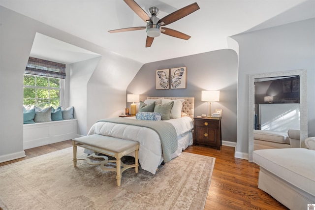 341 Friedman Ave, Paducah, KY 42001 - bedroom with wood finished floors, ceiling fan, and baseboards
