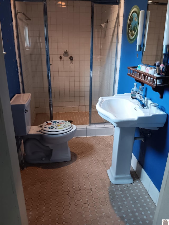 703 Fulton St, Hickman, KY 42050 - full bath featuring toilet, a stall shower, and tile patterned flooring