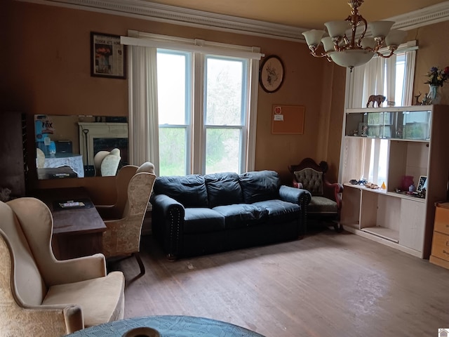 703 Fulton St, Hickman, KY 42050 - living area featuring a chandelier, crown molding, and wood finished floors