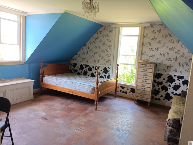 703 Fulton St, Hickman, KY 42050 - bedroom featuring multiple windows, lofted ceiling, and wallpapered walls
