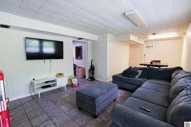1124 Friedman Ln, Paducah, KY 42001 - living room featuring dark tile patterned floors and baseboards