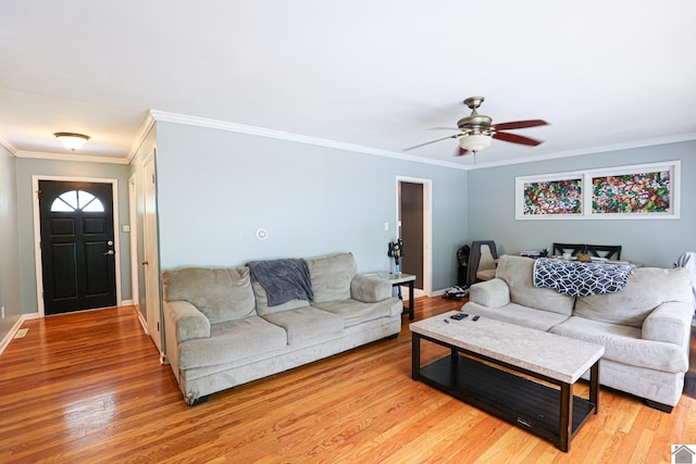 1124 Friedman Ln, Paducah, KY 42001 - living room featuring light wood-type flooring, ceiling fan, ornamental molding, and baseboards