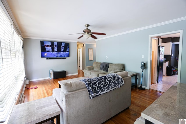 1124 Friedman Ln, Paducah, KY 42001 - living room featuring a ceiling fan, dark wood-style floors, ornamental molding, and baseboards