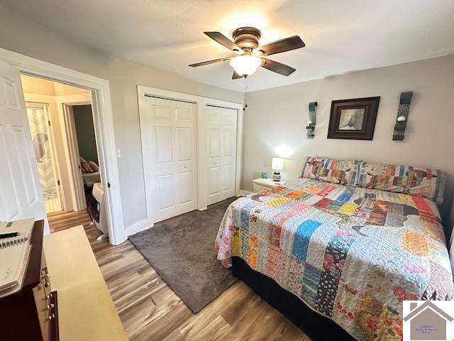 3944 Old Mayfield Rd, Paducah, KY 42003 - bedroom featuring wood finished floors, ceiling fan, and baseboards