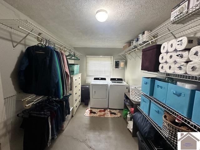 3944 Old Mayfield Rd, Paducah, KY 42003 - clothes washing area with washing machine and clothes dryer and a textured ceiling