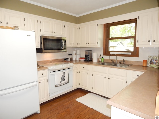 60 Cole Ln, Benton, KY 42025 - kitchen featuring white appliances, a sink, backsplash, dark wood-style floors, and ornamental molding