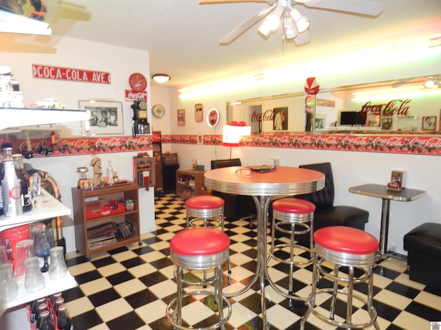 60 Cole Ln, Benton, KY 42025 - bar area with tile patterned floors and a ceiling fan