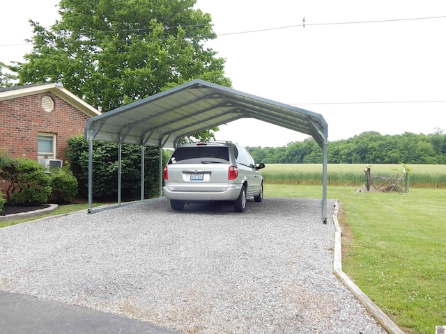 60 Cole Ln, Benton, KY 42025 - view of vehicle parking with driveway and a carport
