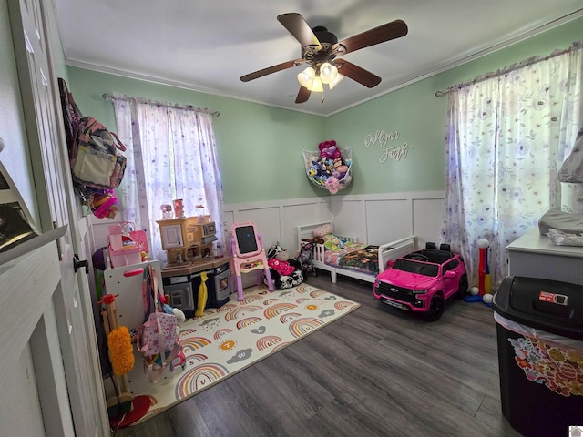 2230 Seneca Ln, Paducah, KY 42001 - game room featuring a wainscoted wall, ornamental molding, wood finished floors, ceiling fan, and a decorative wall