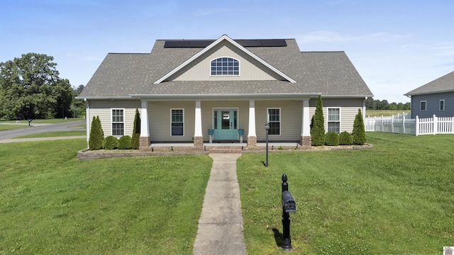 115 Pinewood Trl, West Paducah, KY 42086 - craftsman-style house with covered porch, roof with shingles, and roof mounted solar panels