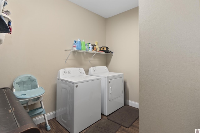 115 Pinewood Trl, West Paducah, KY 42086 - laundry area featuring separate washer and dryer, wood finished floors, and baseboards