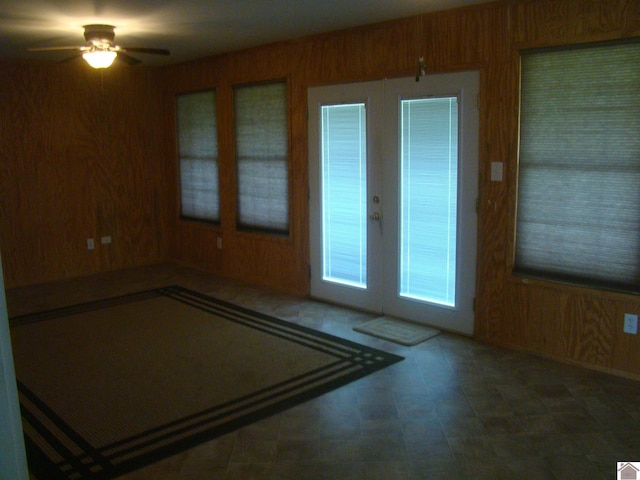 115 Meadowbrook Dr, Cadiz, KY 42211 - unfurnished room featuring ceiling fan and wood walls