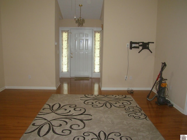 115 Meadowbrook Dr, Cadiz, KY 42211 - foyer with wood finished floors, a chandelier, and vaulted ceiling
