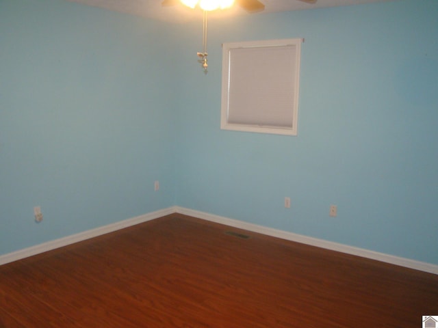 115 Meadowbrook Dr, Cadiz, KY 42211 - empty room with ceiling fan and wood finished floors