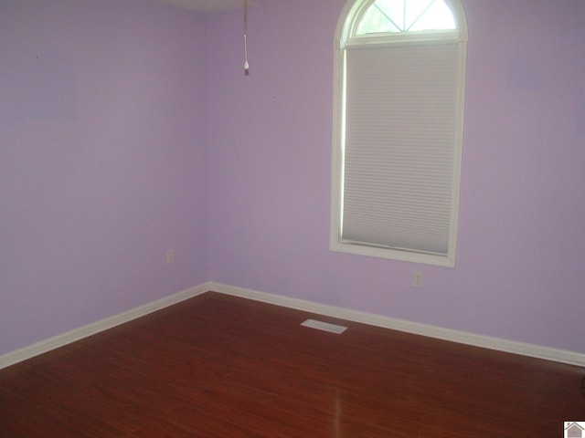 115 Meadowbrook Dr, Cadiz, KY 42211 - unfurnished room featuring wood finished floors and baseboards