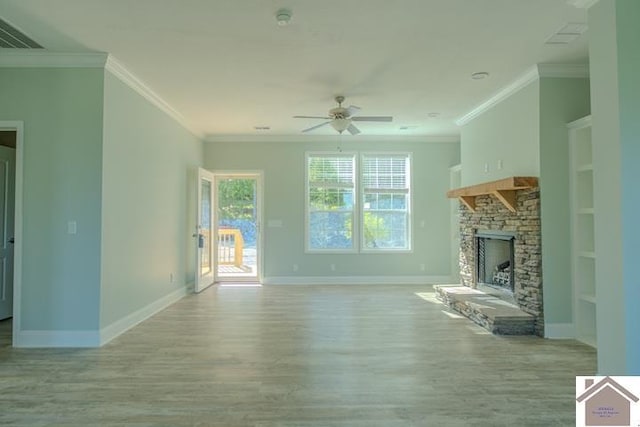 631 Imogene Dr, Gilbertsville, KY 42044 - unfurnished living room featuring light wood-style floors, ceiling fan, crown molding, a fireplace, and baseboards