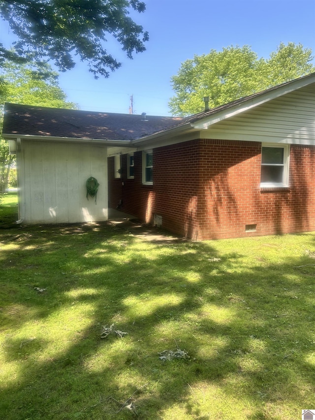 908 N 21st St, Paducah, KY 42001 - rear view of house with a yard, crawl space, and brick siding