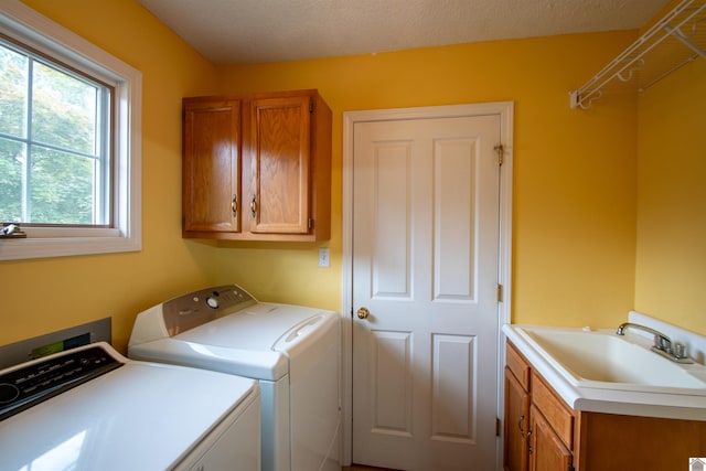1055 Lakeview Dr, Paducah, KY 42003 - laundry area with cabinet space and washing machine and dryer