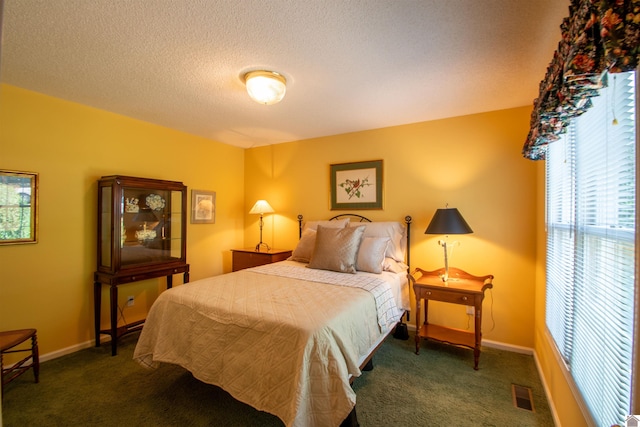 1055 Lakeview Dr, Paducah, KY 42003 - bedroom featuring carpet flooring, baseboards, and a textured ceiling