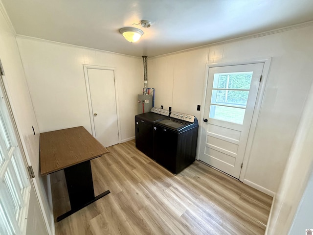 701 N 18th St, Murray, KY 42071 - washroom featuring washing machine and dryer, water heater, light wood-style floors, and crown molding