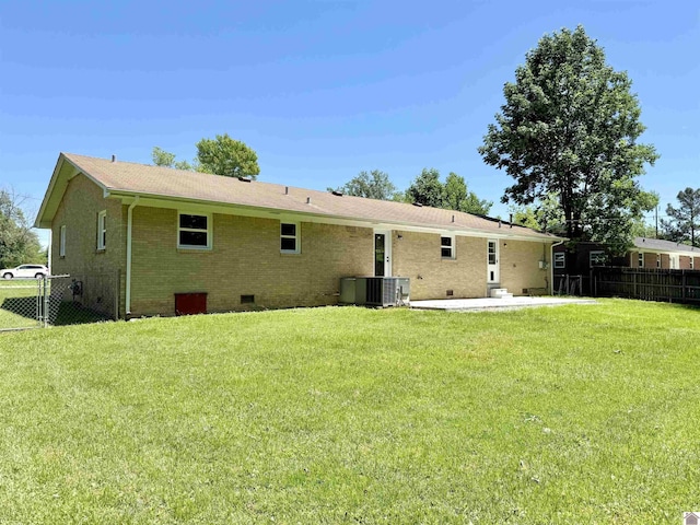 701 N 18th St, Murray, KY 42071 - rear view of house with a patio area, brick siding, crawl space, and a shingled roof
