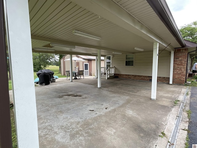 10187 E U S Highway 68, Benton, KY 42025 - view of patio / terrace featuring a carport and grilling area