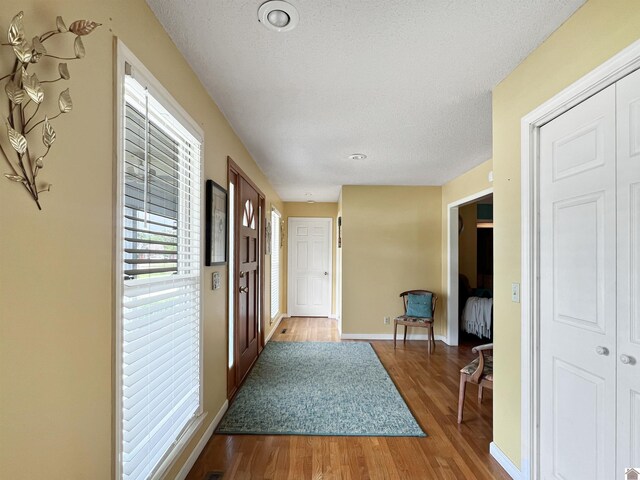 189 Edinborough W, Murray, KY 42071 - entryway with wood finished floors and baseboards