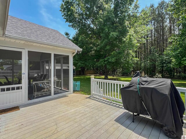 189 Edinborough W, Murray, KY 42071 - deck featuring grilling area, a sunroom, and a yard