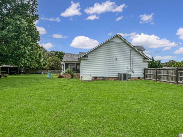 189 Edinborough W, Murray, KY 42071 - rear view of property with cooling unit, a sunroom, crawl space, and a shingled roof