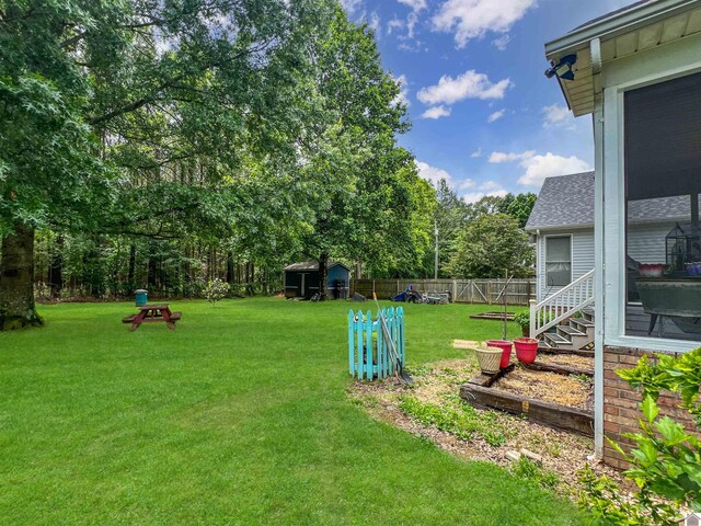 189 Edinborough W, Murray, KY 42071 - view of yard featuring view of wooded area