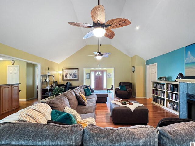 189 Edinborough W, Murray, KY 42071 - living room with lofted ceiling, ceiling fan, wood finished floors, and baseboards