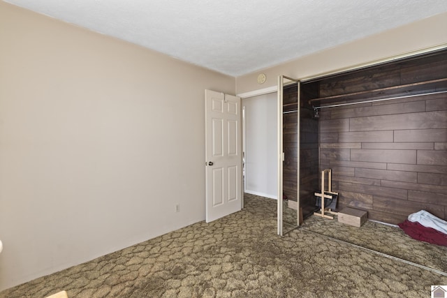 1158 State Route 295, Marion, KY 42064 - unfurnished bedroom featuring carpet flooring, a closet, and a textured ceiling