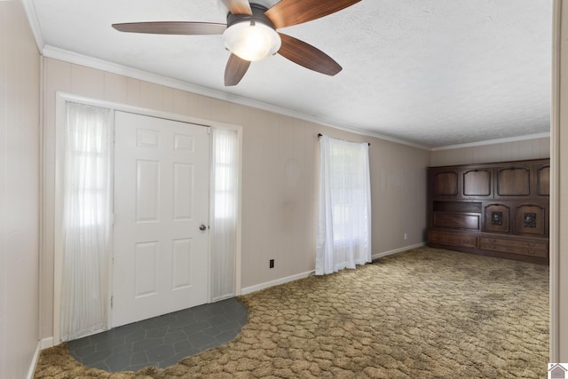 1158 State Route 295, Marion, KY 42064 - foyer entrance featuring ornamental molding, carpet, a ceiling fan, and baseboards