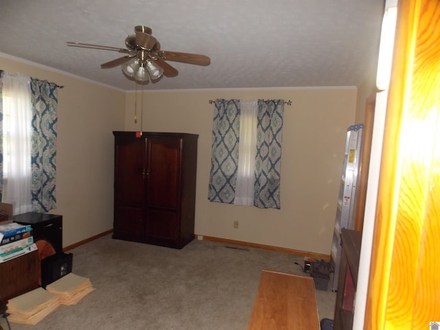 528 Elm, Clinton, KY 42031 - interior space with baseboards, ornamental molding, and a ceiling fan