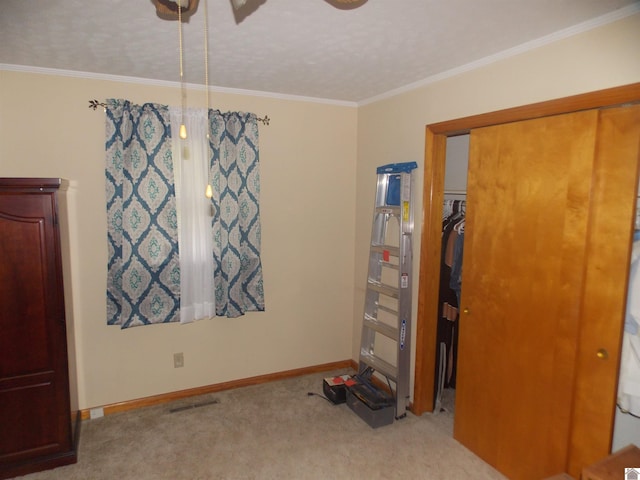 528 Elm, Clinton, KY 42031 - carpeted bedroom featuring baseboards, ornamental molding, and a ceiling fan