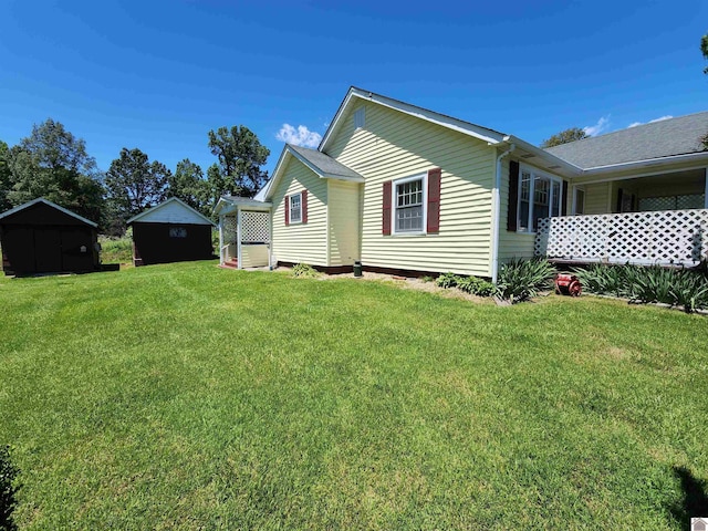 1691 Symsonia Hwy, Benton, KY 42025 - view of side of home with a yard
