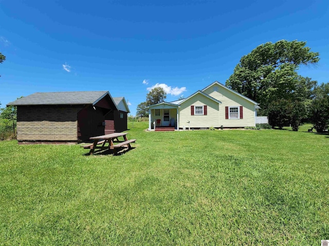 1691 Symsonia Hwy, Benton, KY 42025 - view of green lawn with an outdoor structure