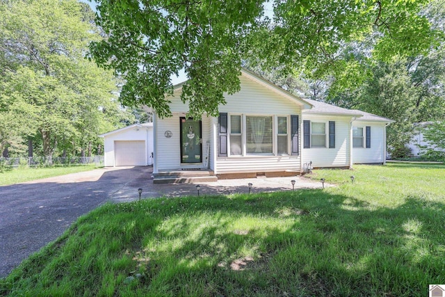 157 Calvert Dr, Paducah, KY 42003 - view of front of house with asphalt driveway, a garage, and crawl space