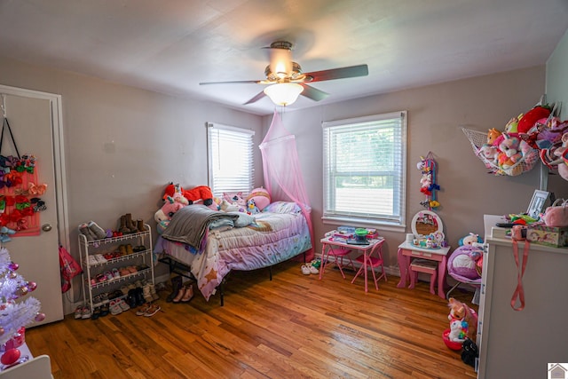 157 Calvert Dr, Paducah, KY 42003 - bedroom featuring wood finished floors and a ceiling fan