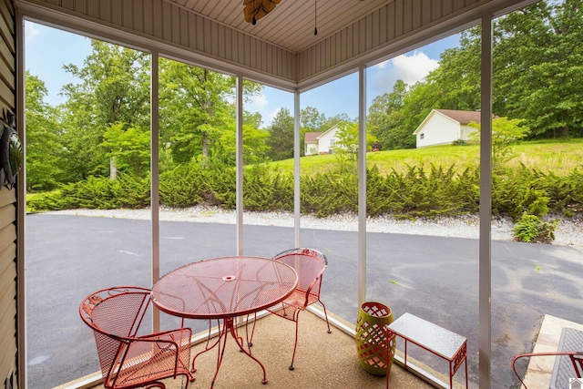 124 Hughes Rd, Benton, KY 42025 - sunroom / solarium with a ceiling fan and view of scattered trees
