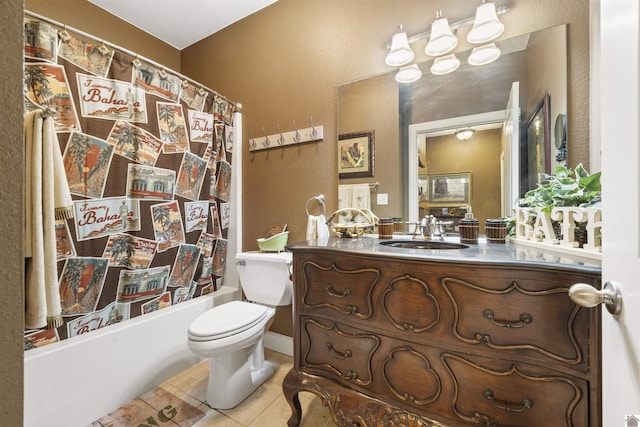 124 Hughes Rd, Benton, KY 42025 - full bathroom with a textured wall, vanity, toilet, tile patterned floors, and shower / tub combo with curtain